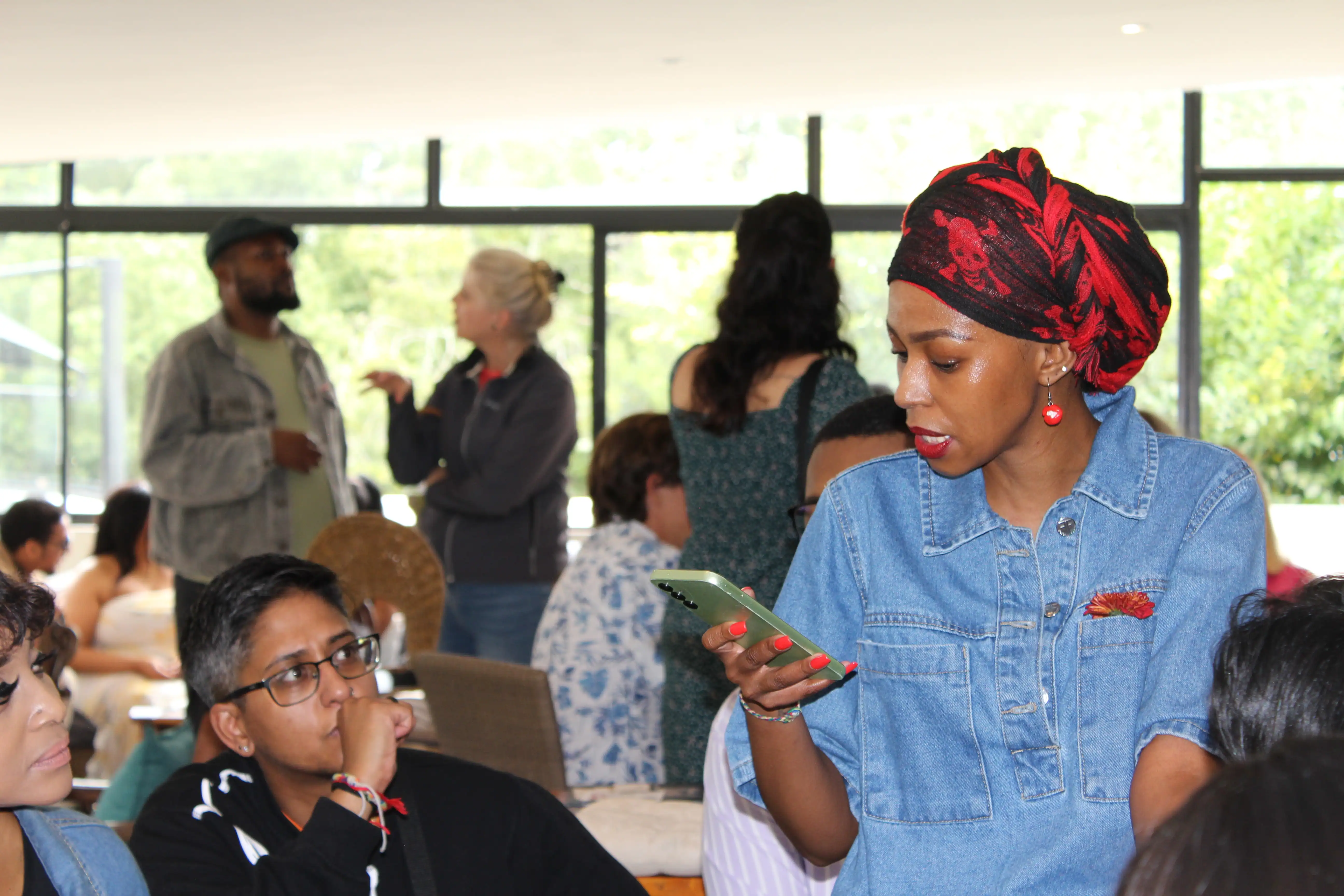 Audience and poets connecting during the immersive book launch game